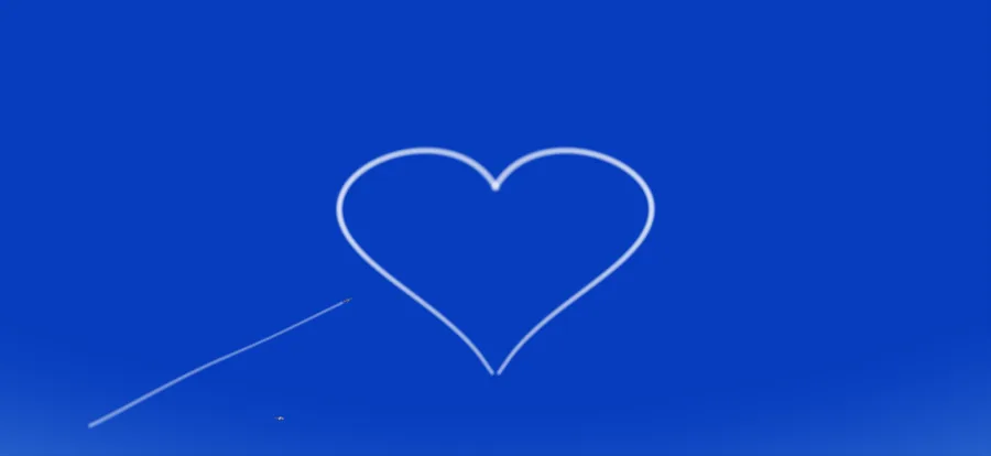 展示飛行モードのキューピッド。2 機がハートを描き、1 機が矢のように貫く